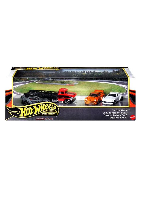 Hot Wheels toy truck set in packaging with a scenic background
